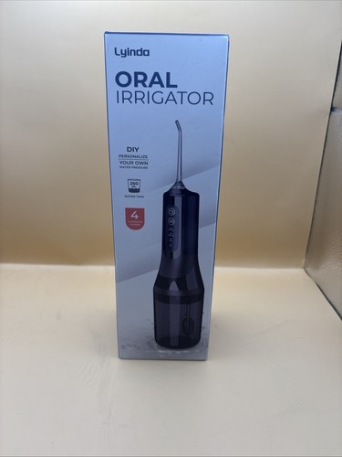 Portable oral irrigator - portable, irrigator,