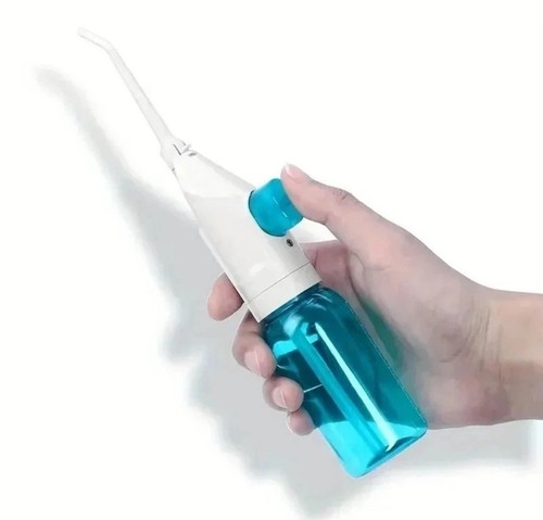 Portable manual water flosser - portable,